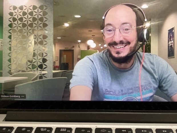 Screen portrait Gideon Goldberg during virtual meeting